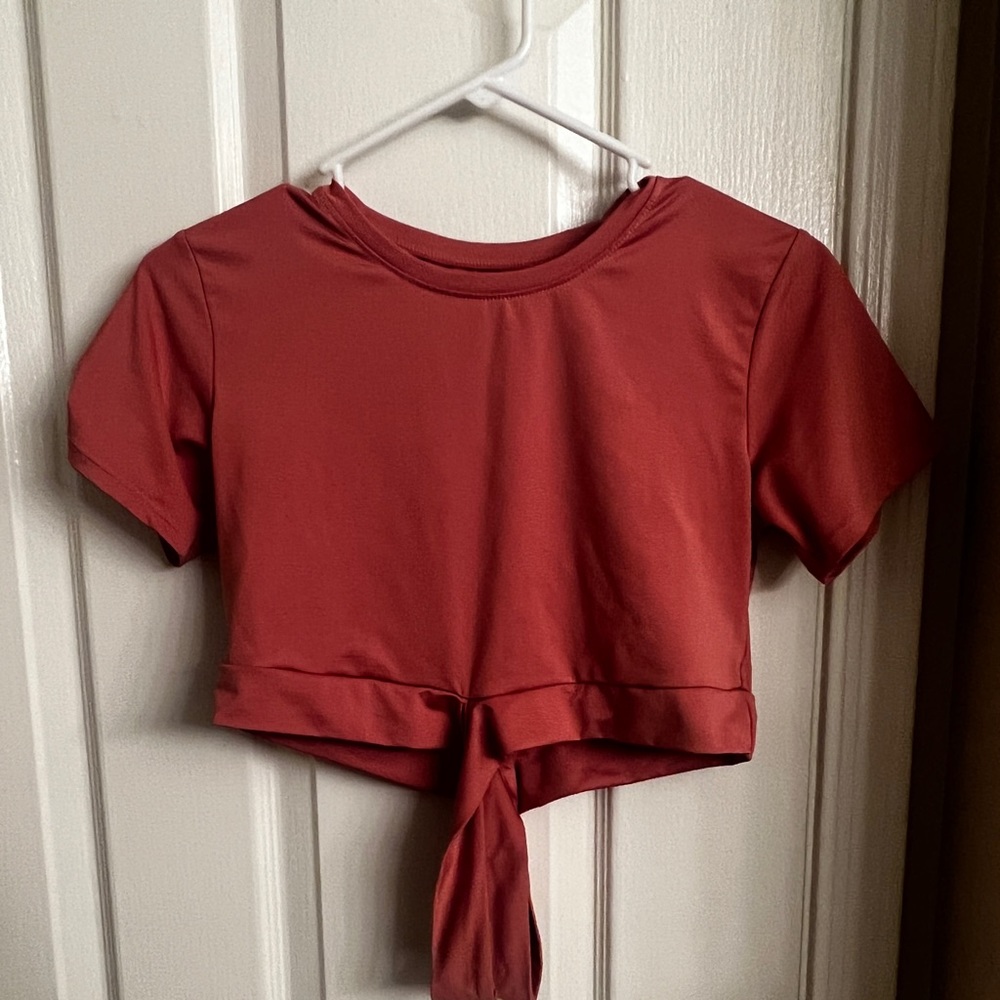 Nvgtn cross crop. Color inaccurate in full shirt photo Tag picture is true color